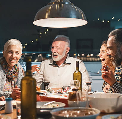 Family at table laughing